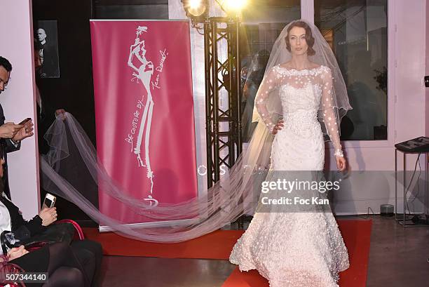 Model walks the Runway during the Jean Doucet 'Bonheur Pour Tous' Gay and Lesbian Wedding dresses show as part of Paris Fashion Week on January 28,...