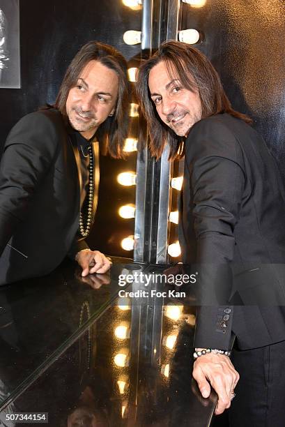 Fashion designer Jean Doucet poses during the Jean Doucet 'Bonheur Pour Tous' Gay and Lesbian Wedding dresses show as part of Paris Fashion Week on...