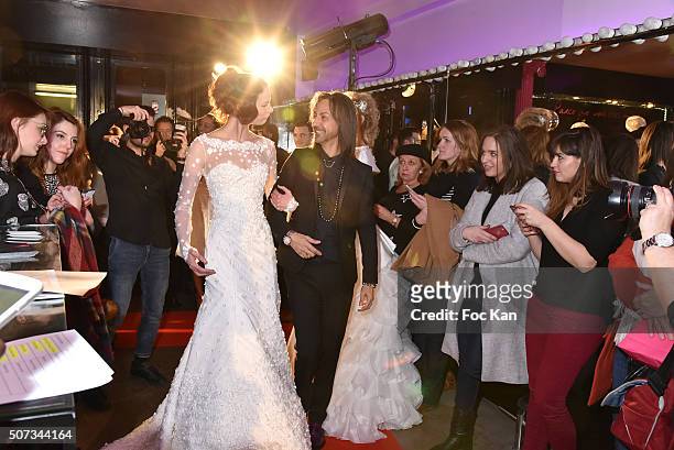 Fashion designer Jean Doucet and a 'Bride' walk the Runway during the Jean Doucet 'Bonheur Pour Tous' Gay and Lesbian Wedding dresses show as part of...