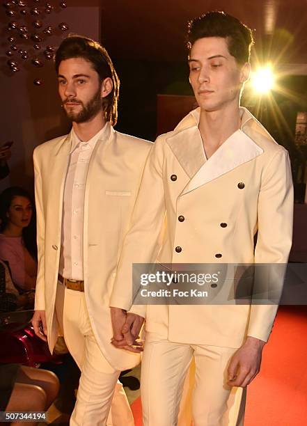 Couple' of models walk the Runway during the Jean Doucet 'Bonheur Pour Tous' Gay and Lesbian Wedding dresses show as part of Paris Fashion Week on...