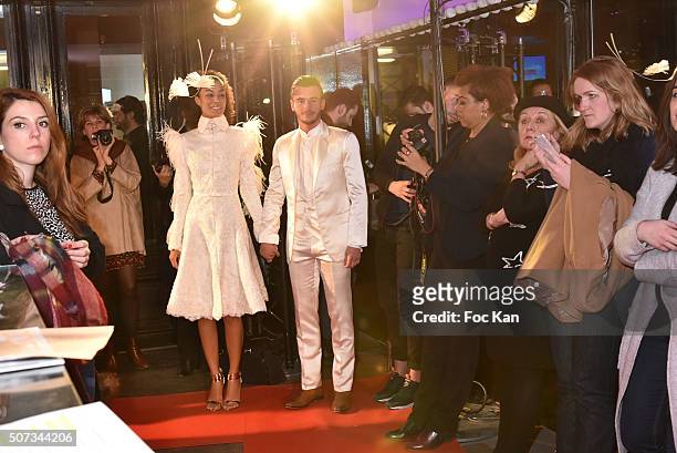 Couple' of models walk the Runway during the Jean Doucet 'Bonheur Pour Tous' Gay and Lesbian Wedding dresses show as part of Paris Fashion Week on...