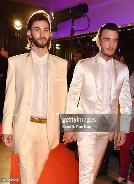 Couple' of models walk the Runway during the Jean Doucet 'Bonheur Pour Tous' Gay and Lesbian Wedding dresses show as part of Paris Fashion Week on...