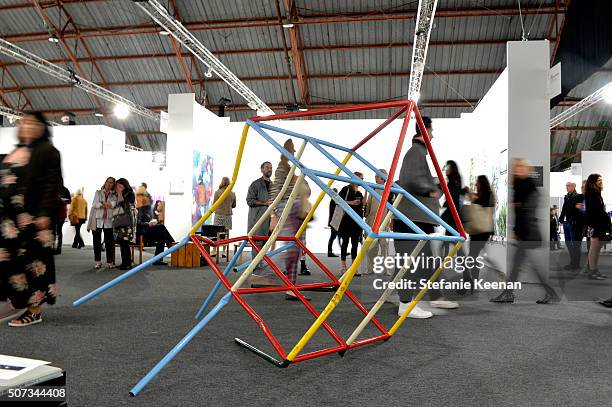 Guests attend the Art Los Angeles Contemporary 2016 Opening Night at Barker Hangar on January 28, 2016 in Santa Monica, California.