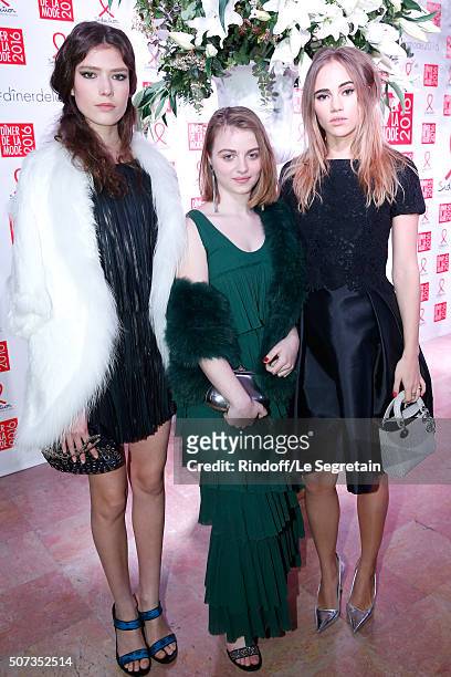 Guest, Lou Roy-Lecollinet and Suki Waterhouse attend the Sidaction Gala Dinner 2016 as part of Paris Fashion Week. Held at Pavillon d'Armenonville on...
