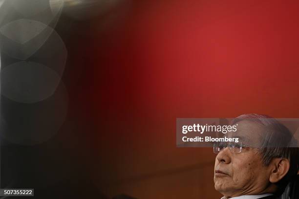 Haruhiko Kuroda, governor of the Bank of Japan , listens to a question during a news conference at the central bank's headquarters in Tokyo, Japan,...