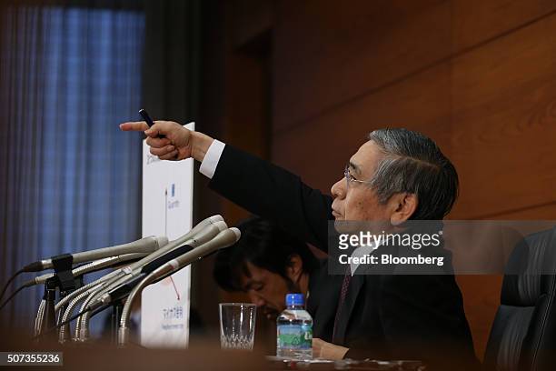 Haruhiko Kuroda, governor of the Bank of Japan , takes a question during a news conference at the central bank's headquarters in Tokyo, Japan, on...