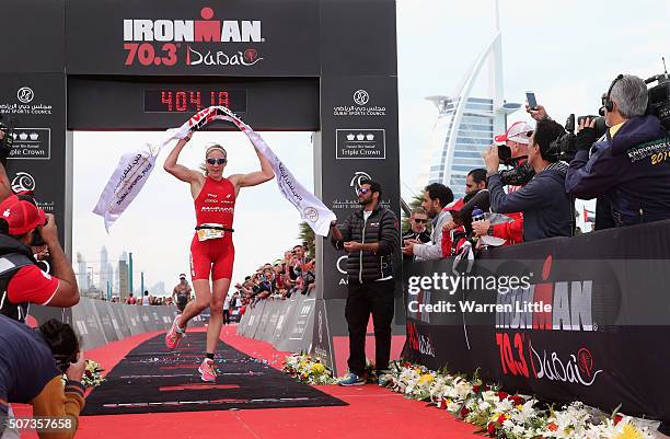 Daniela Ryf of Switzerland celebrates winning the Women's IRONMAN 70.3 Dubai on January 29, 2016 in Dubai, United Arab Emirates.