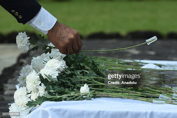 Relatives of the fallen Japanese soldiers of WW2 offer flowers and prayers to their dead during a ceremony at a Japanese war memorial in the...