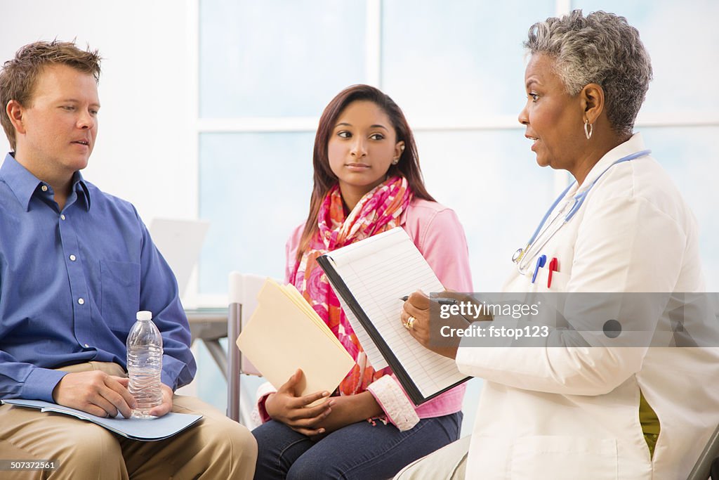 Psychiatrist counseling session with man, woman patients. Therapy.