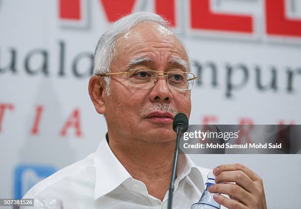 Malaysian Prime Minister Najib Razak speaks at a news conference after attending the UMNO Supreme Council meeting at Putra World Trade Centre on...