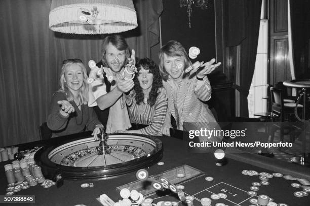 Swedish pop group Abba posed at a press conference in London on 16th February 1977. From left to right: Agnetha Faltskog, Benny Andersson, Anni-Frid...