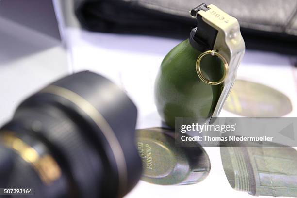 Hand granade is displayed at a press conferece after an unknown assailant threw a live hand grenade to a migrant shelter at the night before on...