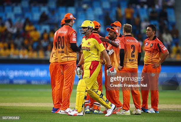 Adam Gilchrist of Sagittarius Strikers walks back after being dismissed by Azhar Mahmood of Virgo Super Kings during the Oxigen Masters Champions...