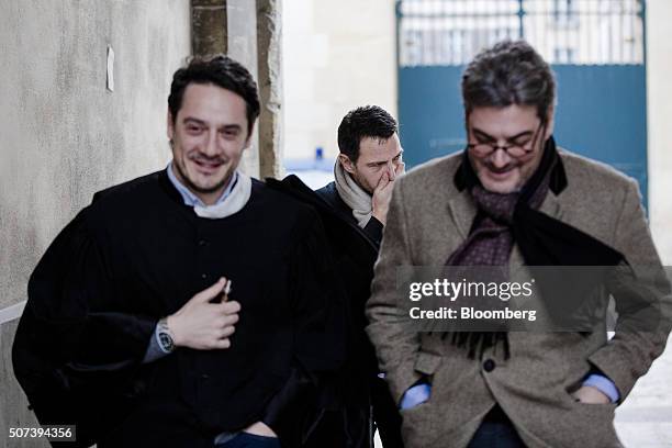 Jerome Kerviel, former trader for Societe Generale SA, center, arrives at Versailles courthouse with David Koubbi, a lawyer, left, in Versailles,...