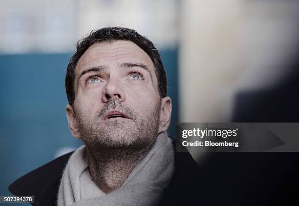 Jerome Kerviel, former trader for Societe Generale SA, reacts as he arrives outside Versailles courthouse in Versailles, France, on Friday, Jan. 29,...