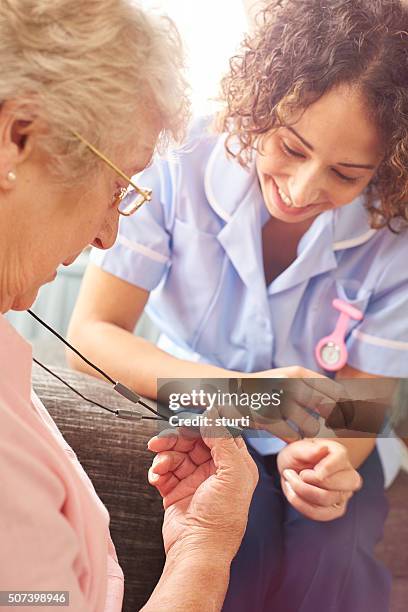 panic alarm necklace - motion detector stock pictures, royalty-free photos & images