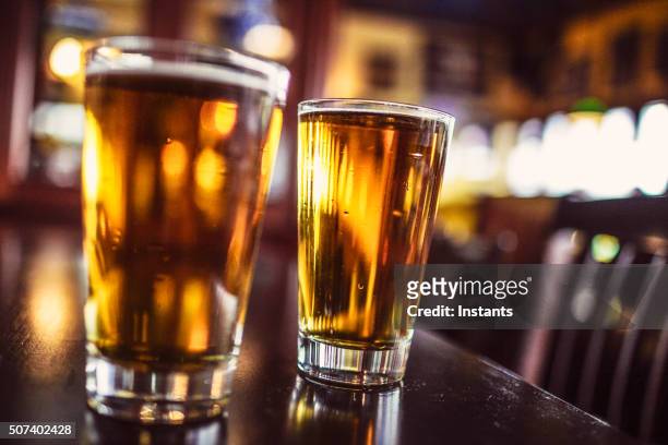 glasses of beer - beer taps bildbanksfoton och bilder