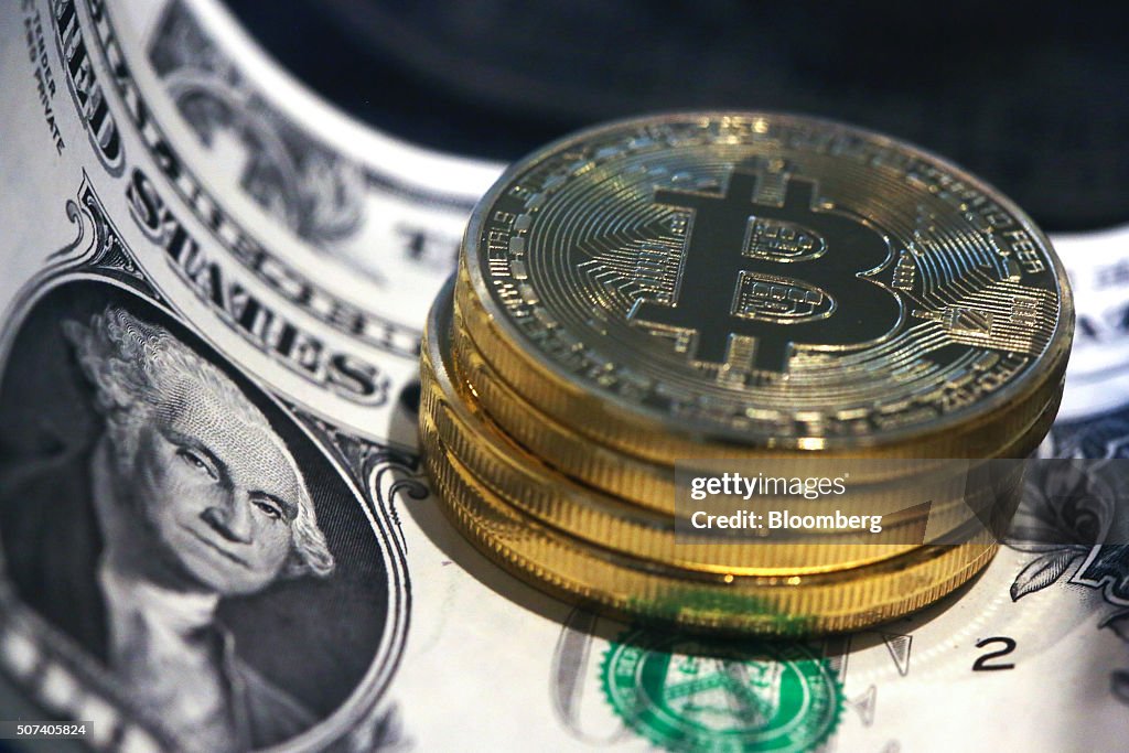 Bitcoins And U.S. Dollar Notes As IMF Vouches For Virtual Currencies