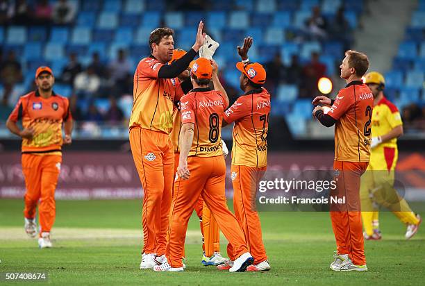 Jacob Oram of Virgo Super Kings celebrates taking the wicket of Mahela Jayawardene of Sagittarius Strikers with team mates during the Oxigen Masters...