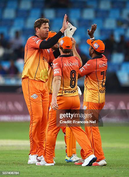 Jacob Oram of Virgo Super Kings celebrates taking the wicket of Mahela Jayawardene of Sagittarius Strikers with team mates during the Oxigen Masters...