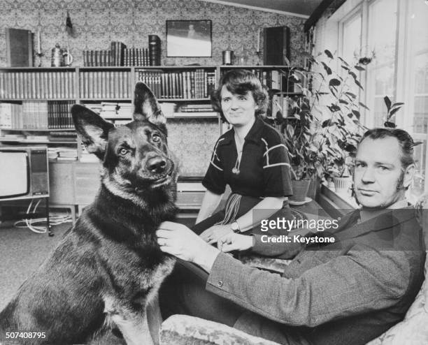 Swedish Nazi Goran Assar Oredsson, Leader of the Nordic National Party, with wife Vera and pet dog at home, circa 1965.