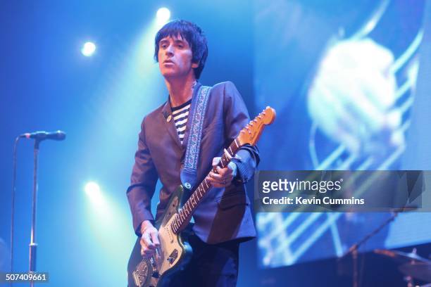 Johnny Marr performs on stage at City Live, Manchester City Football Club's Season Launch Party, at Manchester Central on 14th August 2014. He is...