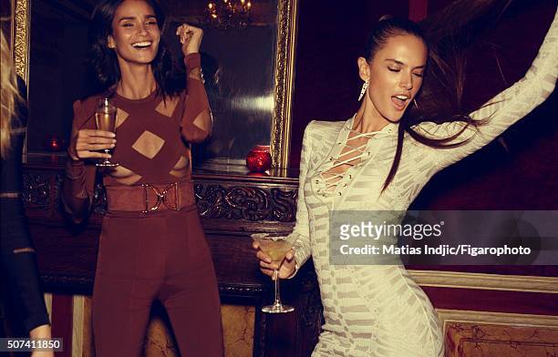 Model Caroline Ribeiro and Alessandra Ambrosio are photographed for Madame Figaro on October 1, 2015 in Paris, France. Caroline Ribeiro: Body, belt...