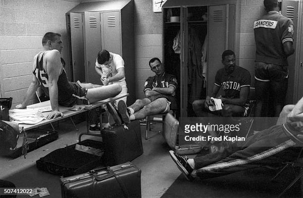 Boston Celtics Tom Heinsohn, Bob Cousy, Bill Russell, Tom Satch Sanders in locker room before gmae vs Los Angeles Lakers at Boston Garden. Boston, MA...