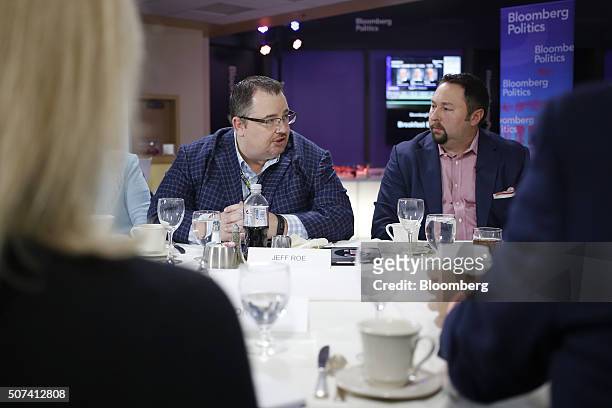 Jeff Roe, campaign manager for Senator Ted Cruz, a Republican from Texas and 2016 presidential candidate, left, speaks as Jason Johnson, chief...