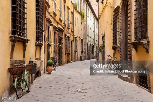 via sant'andrea in the historic centre of lucca - lucca italy stock pictures, royalty-free photos & images