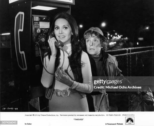 Marlo Thomas makes an extramarital rendezvous phone call is overheard by Mercedes McCambridge in a scene from the Paramount Pictures movie"Thieves",...