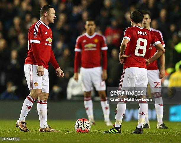 Wayne Rooney and Juan Mata of Manchester United look dejected as George Thorne of Derby County scores their first and equalising goal during the...