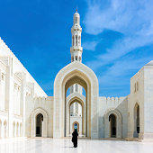 Walking Woman in Sultan Qaboos Grand Mosque Muscat Oman