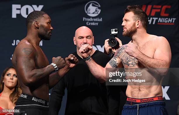 Opponents Anthony Johnson and Ryan Bader face off during the UFC Fight Night weigh-in at the Prudential Center on January 29, 2016 in Newark, New...