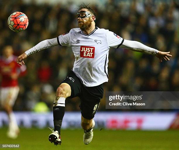 Richard Keogh of Derby County heads the ball during the Emirates FA Cup fourth round match between Derby County and Manchester United at iPro Stadium...