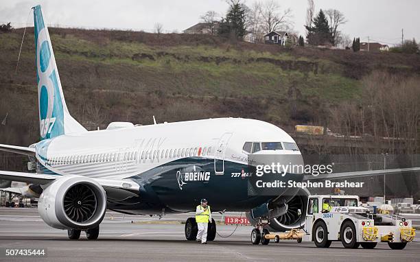 Boeing 737 MAX 8 airliners taxis after landing at Boeing Field to complete its first flight on January 29, 2016 in Seattle, Washington. The 737 MAX...