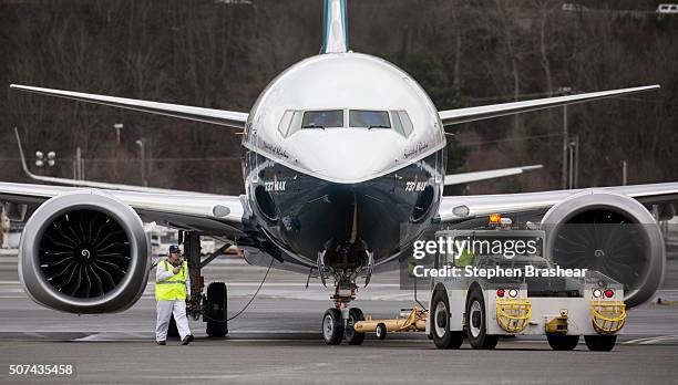 Boeing 737 MAX 8 airliners taxis after landing at Boeing Field to complete its first flight on January 29, 2016 in Seattle, Washington. The 737 MAX...