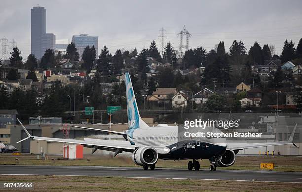 Boeing 737 MAX 8 airliner lands at Boeing Field to complete its first flight on January 29, 2016 in Seattle, Washington. The 737 MAX is the newest...