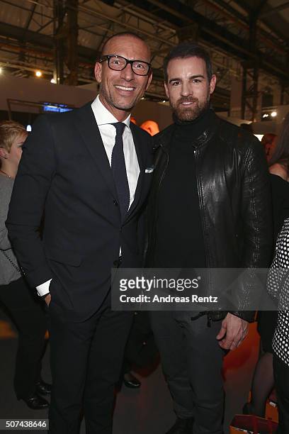 Andreas Rebbelmund and Christoph Metzelder attend the Breuninger after show party during Platform Fashion January 2016 at Areal Boehler on January...