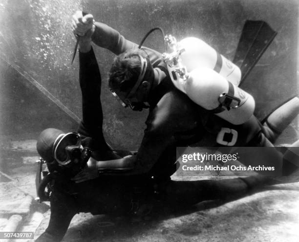 Sean Connery as James Bond is attacked by a diver in a scene from the movie "Thunderball", circa 1965.