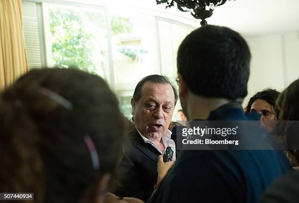 Gustavo Santos, Argentina's minister of tourism, speaks to members of the media after the arrival of an Alas Uruguay inaugural flight in Buenos...