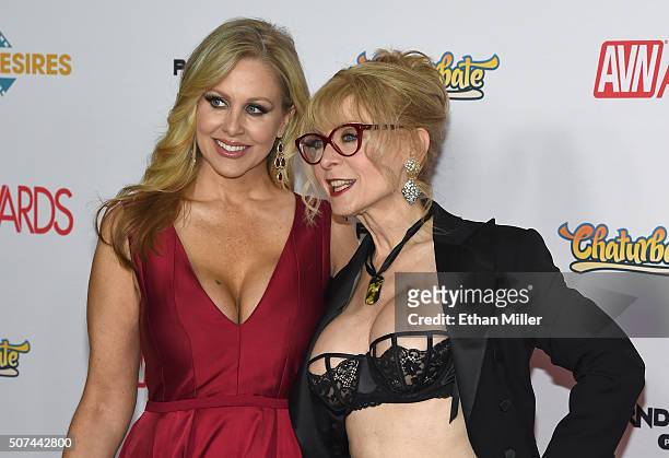 Adult film actress Julia Ann and adult film actress/director Nina Hartley attend the 2016 Adult Video News Awards at the Hard Rock Hotel & Casino on...