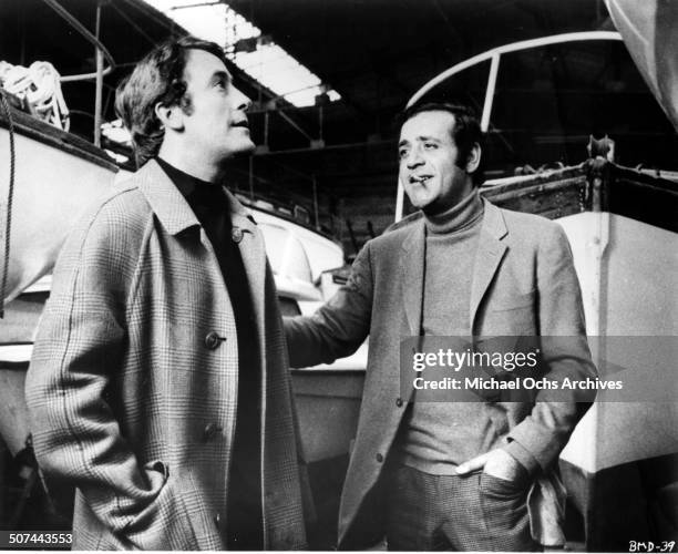Michel Duchaussoy and Jean Yanne talk about boats in a scene from the movie "This Man Must Die" , circa 1969.