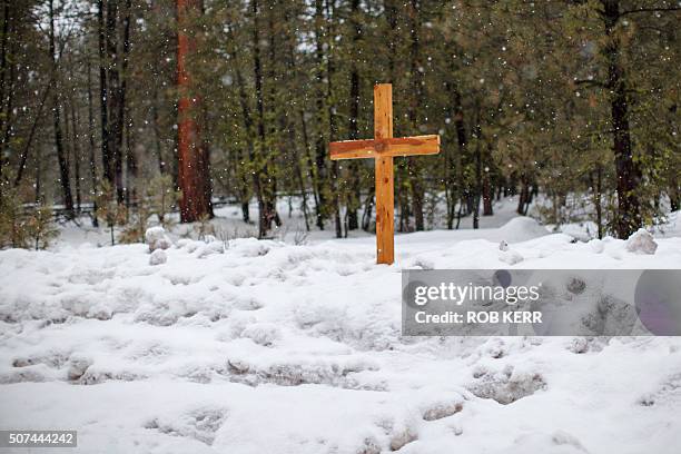 Handmade wooden cross is placed near on Highway 395 near Burns, Oregon on January 29 at the location where Robert "LaVoy" Finicum was shot dead and...