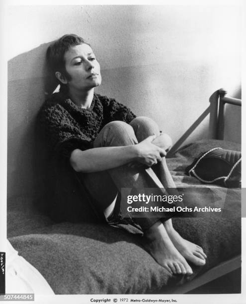 Annie Girardot sits in jail in a scene from the MGM movie "To Die of Love" aka "Mourir d'aimer". Circa 1972.