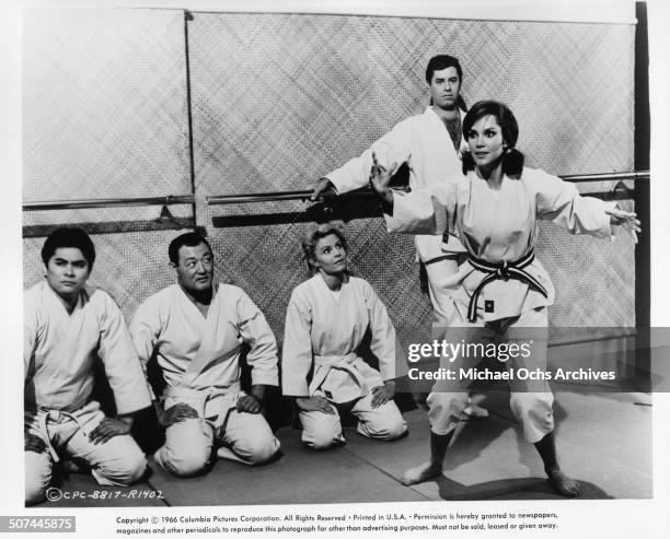 Mary Ann Mobley takes karate with Jerry Lewis in a scene from the movie "Three on a Couch", circa 1966.