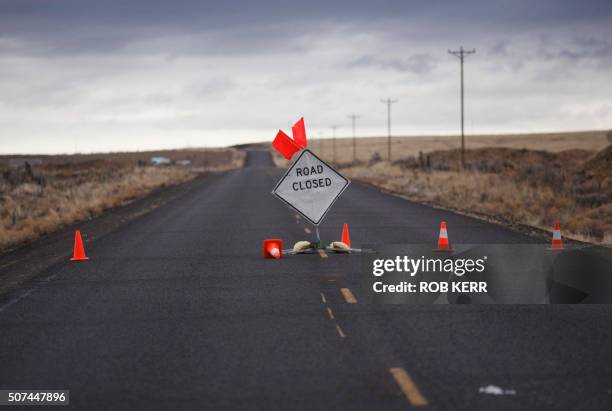 Sign is placed on a closed road to the occupied federal wildlife refuge near Burns, Oregon on January 29 a day after the FBI released video showing...