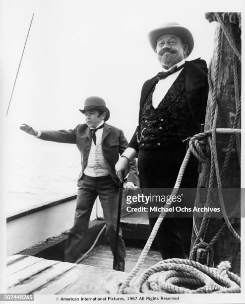 Burl Ives as Phineas T. Barnum and Jimmy Clitheroe as General Tom Thumb set sail in a scene from the movie "Those Fantastic Flying Fools", circa 1967.