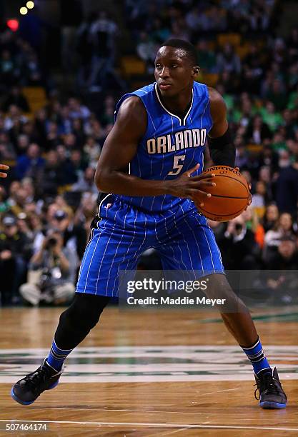 Victor Oladipo of the Orlando Magic carries the ball against the Boston Celtics during the first quarter at TD Garden on January 29, 2016 in Boston,...