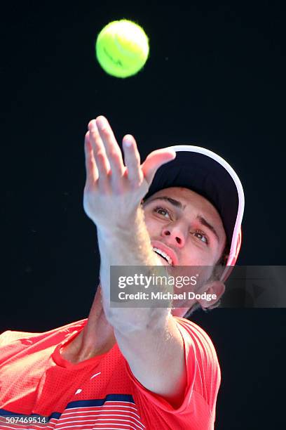 Oliver Anderson of Australia serves in his Junior Boys' Singles Final match against Jurabeck Karimov of Uzbekistan during the Australian Open 2016...